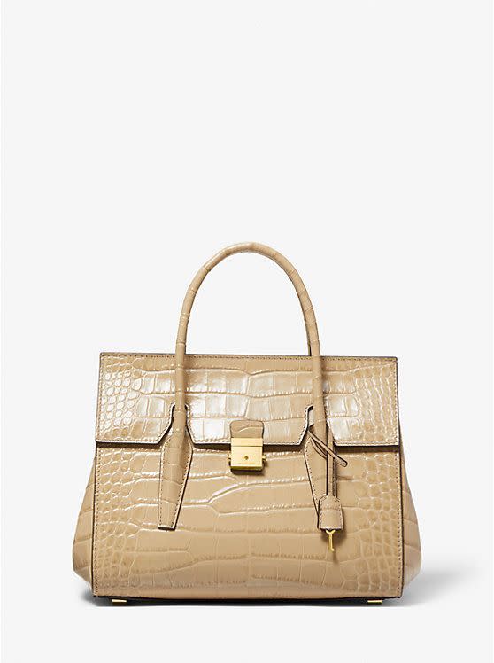 <p><a href="https://go.redirectingat.com?id=74968X1596630&url=https%3A%2F%2Fwww.michaelkors.com%2Fcampbell-medium-crocodile-embossed-leather-satchel%2F31S3GCBS3C.html&sref=https%3A%2F%2Fwww.townandcountrymag.com%2Fstyle%2Ffashion-trends%2Fa46106296%2F2024-bag-trends%2F" rel="nofollow noopener" target="_blank" data-ylk="slk:Shop Now;elm:context_link;itc:0;sec:content-canvas" class="link rapid-noclick-resp">Shop Now</a></p><p>Campbell Medium Croc-Embossed Leather Satchel</p><p>michaelkors.com</p><p>$1750.00</p>