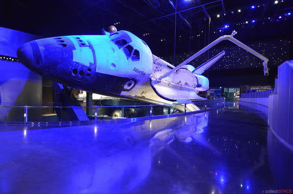 Bathed in simulated Earth-shine, space shuttle Atlantis comes to life in its new $100 million exhibit opening Saturday, June 29 at NASA's Kennedy Space Center Visitor Complex.