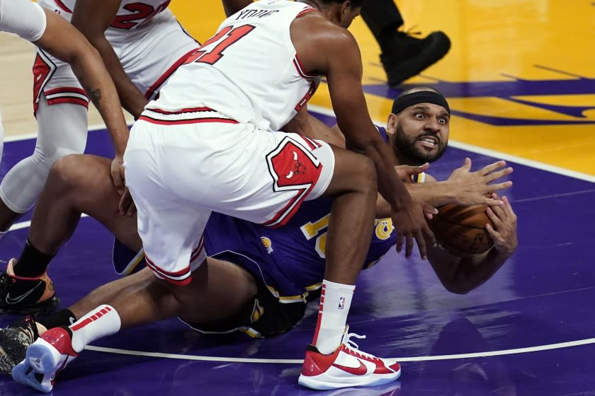 Lakers' Jared Dudley asks for a timeout after grabbing a loose ball against the Bulls on Jan. 8, 2020.