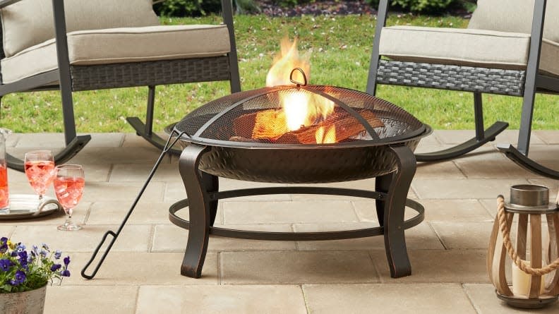 Gather around this fire pit to make some S'mores.