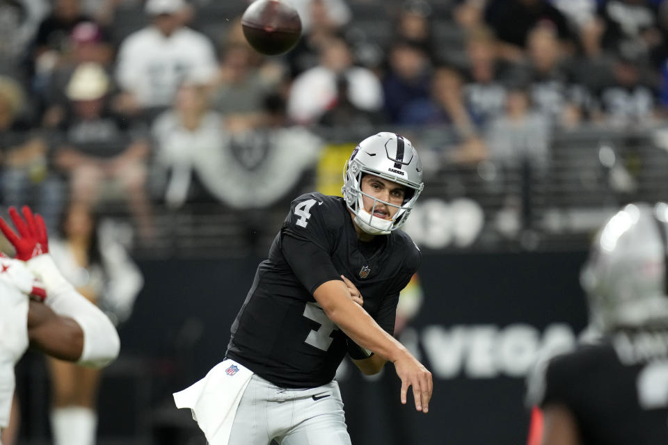 Las Vegas Raiders quarterback Aidan O'Connell (4) throws against the New York Giants during the second half of an NFL football game, Sunday, Nov. 5, 2023, in Las Vegas. (AP Photo/John Locher)
