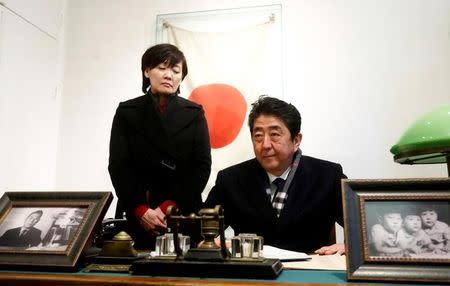 Japan's Prime Minister Shinzo Abe and his wife Akie Abe visit a former home of Chiune Sugihara, a Jew-saving Japanese diplomat, in Kaunas, Lithuania January 14, 2018. REUTERS/Ints Kalnins