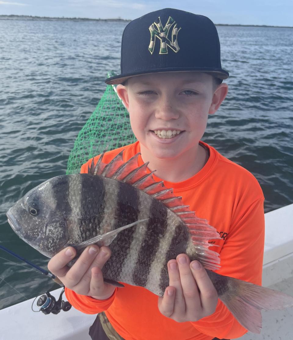 Jack Hugill with a sheepshead he caught aboard Capt. Jeff Patterson's Pole Dancer charter.