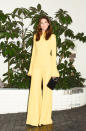 <p>The actress added a pop of colour to the wintry party in a lemon yellow Brandon Maxwell ensemble. <em>[Photo: Rex Features]</em> </p>