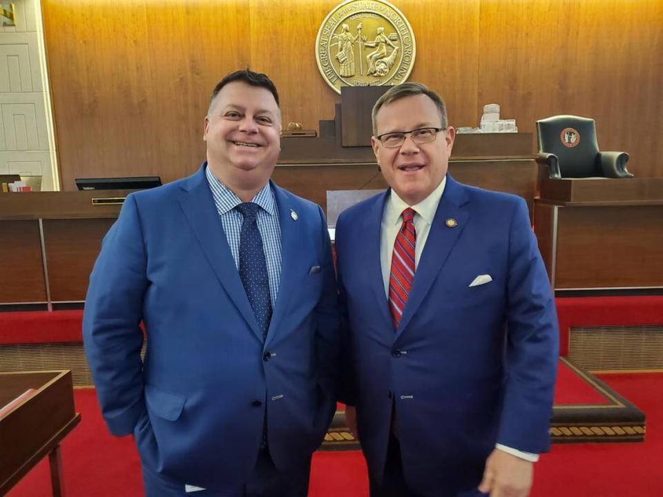 North Carolina state Rep. Jason Saine, left, who chairs the powerful Appropriations Committee, and House Speaker Tim Moore, both Republicans. Lawmakers are negotiating a state budget deal between the House and Senate before sending it to the governor.