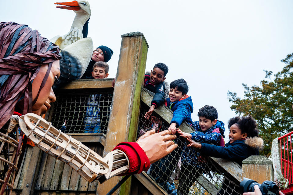 Little Amal visits children in the Madurodam miniature park in The Hague, Netherlands, on Nov. 15, 2021.