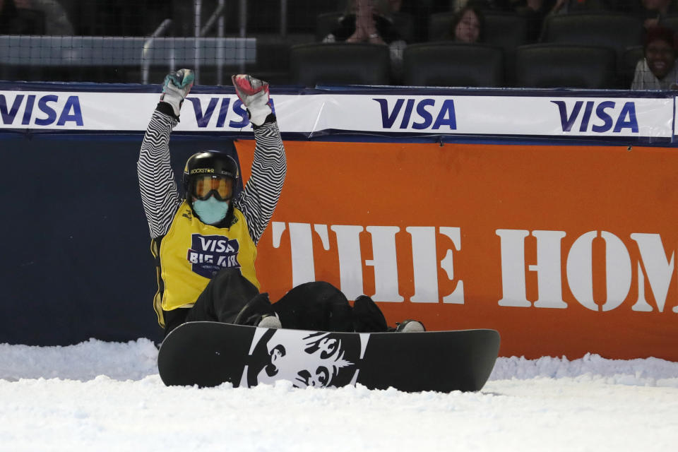 Chris Corning reacts after his final jump in the finals of the Big Atlanta snowboard competition Friday, Dec. 20, 2019, in Atlanta. Corning won the event. (AP Photo/John Bazemore)