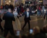 <p>Crossing the street with Brad Pitt at the 2015 premiere of <em>By the Sea.</em></p>