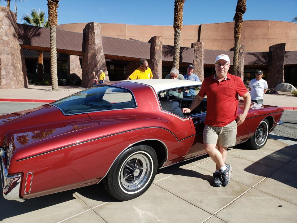 Sandy Edelstein proudly shows off his 1972 Buick Rivera at the Modernism Week Vintage Car Show.