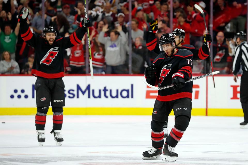 Carolina Hurricanes' Tony DeAngelo (77) celebrates his goal during Game 5 of an NHL hockey Stanley Cup first-round playoff series against the Boston Bruins in Raleigh, N.C., Tuesday, May 10, 2022. DeAngelo was traded to the Philadelphia Flyers on Friday.