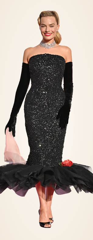 Margot Robbie at the L.A. premiere of Barbie, wearing a black sequined Schiaparelli.