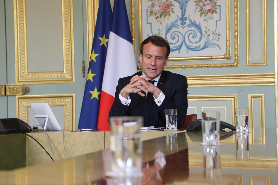 French president Emmanuel Macron takes part in a visioconference with World Health Organization (WHO) general director Tedros Adhanom Ghebreyesus at the Elysee Palace on april 8, 2020 in Paris. (Photo by Ludovic MARIN / POOL / AFP) (Photo by LUDOVIC MARIN/POOL/AFP via Getty Images)