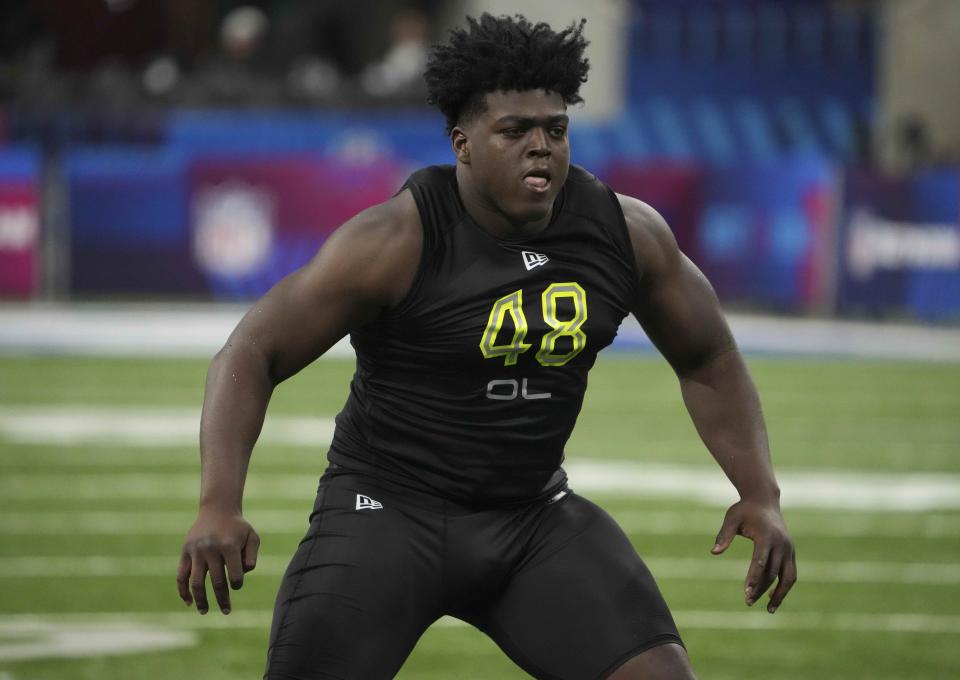 Mar 4, 2022; Indianapolis, IN, USA; Tulsa offensive lineman Tyler Smith (OL48) goes through drills during the 2022 NFL Scouting Combine at Lucas Oil Stadium. Mandatory Credit: Kirby Lee-USA TODAY Sports