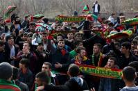 Amedspor fans cheers outside the stadium before the Turkish Cup quarter final first leg soccer match between Amedspor and Fenerbahce in the Kurdish-dominated southeastern city of Diyarbakir, Turkey February 9, 2016. REUTERS/Sertac Kayar