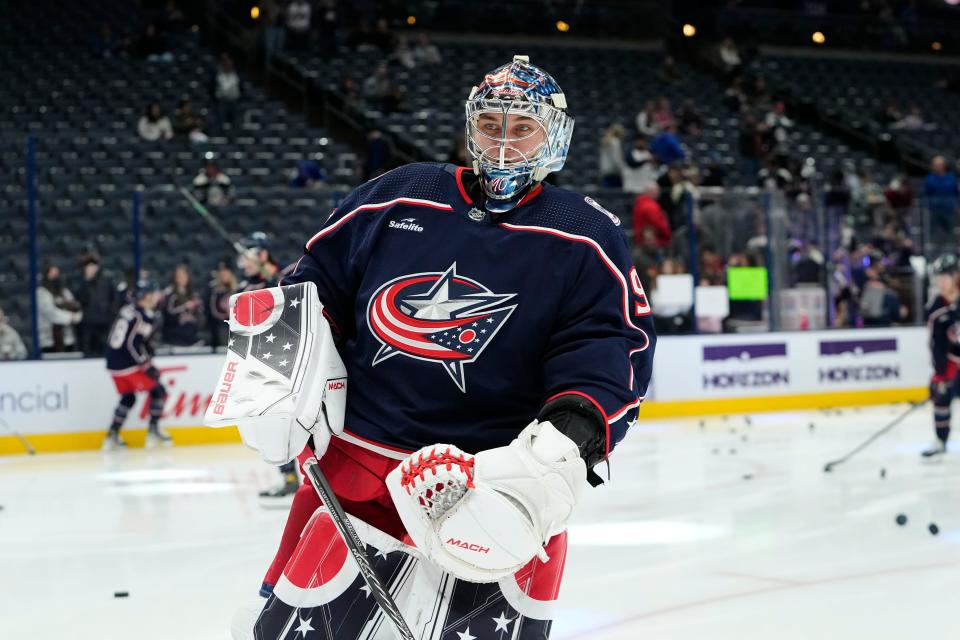 Mar 24, 2023; Columbus, Ohio, USA;  Columbus Blue Jackets goaltender Elvis Merzlikins (90) warms up prior to the NHL hockey game against the New York Islanders at Nationwide Arena. Mandatory Credit: Adam Cairns-The Columbus Dispatch