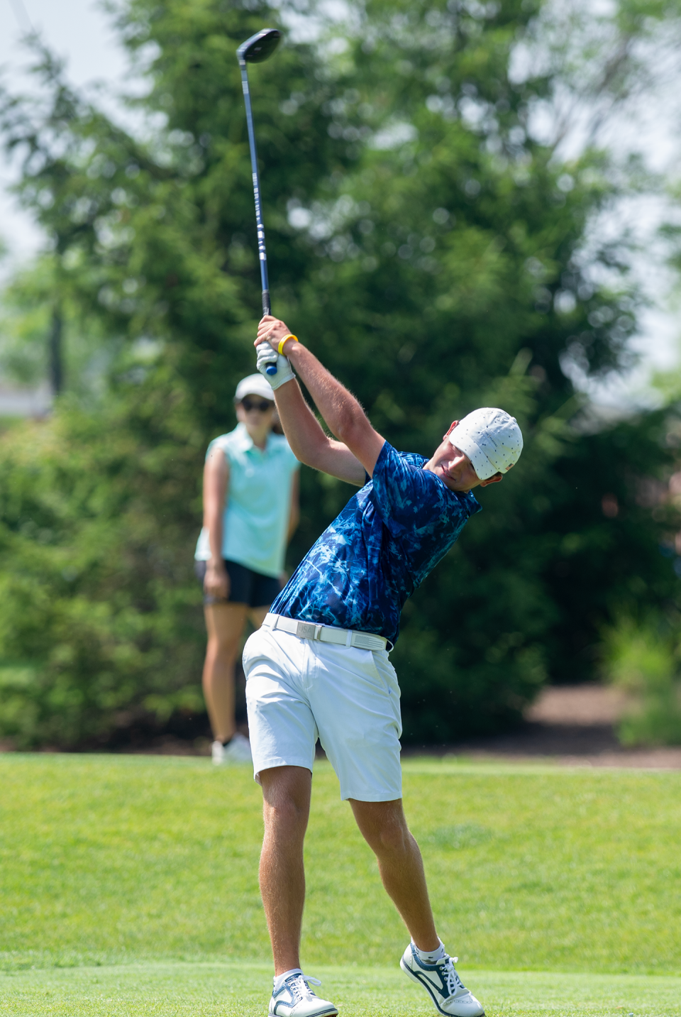 Golfer Chris Pollak hits a ball in the Hudson Junior Invitational at the Country Club of Hudson on June 20, 2024.