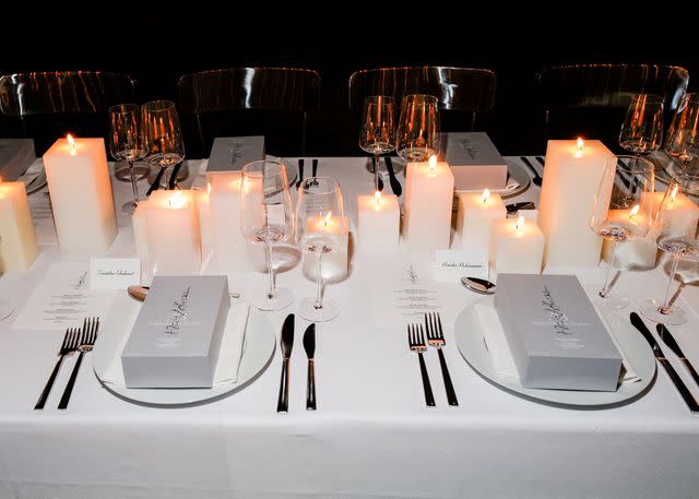 <p>Madison McGaw/BFA.com</p> Timothée Chalamet and designer Haider Ackermann's place tags for NYFW dinner