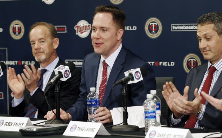  Derek Falvey, middle, is the 33-year-old leader of the Minnesota Twins. (AP)