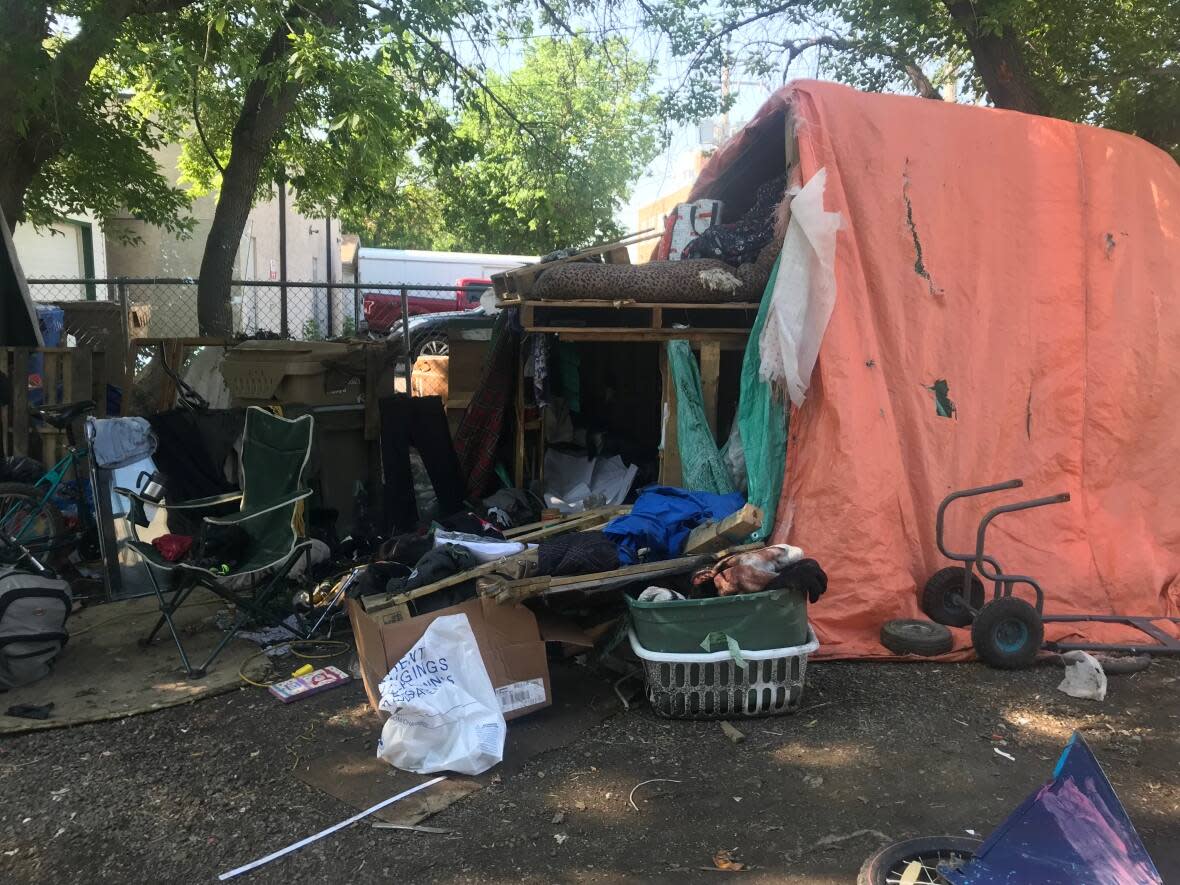 Police and support workers were present as residents were removed from the site.   (Janani Whitfield/CBC  - image credit)