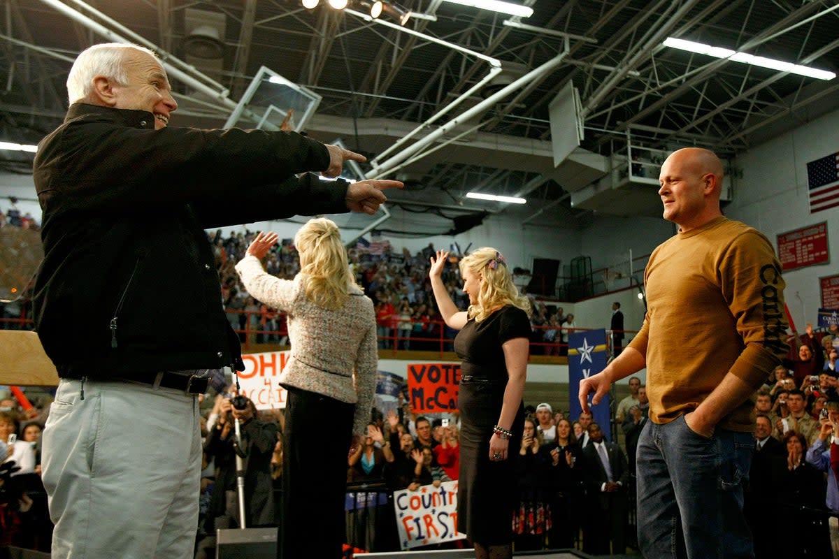 John McCain, the Republican candidate for president,  introduces Wurzelbacher at a campaign rally in October 2008 (Getty Images)