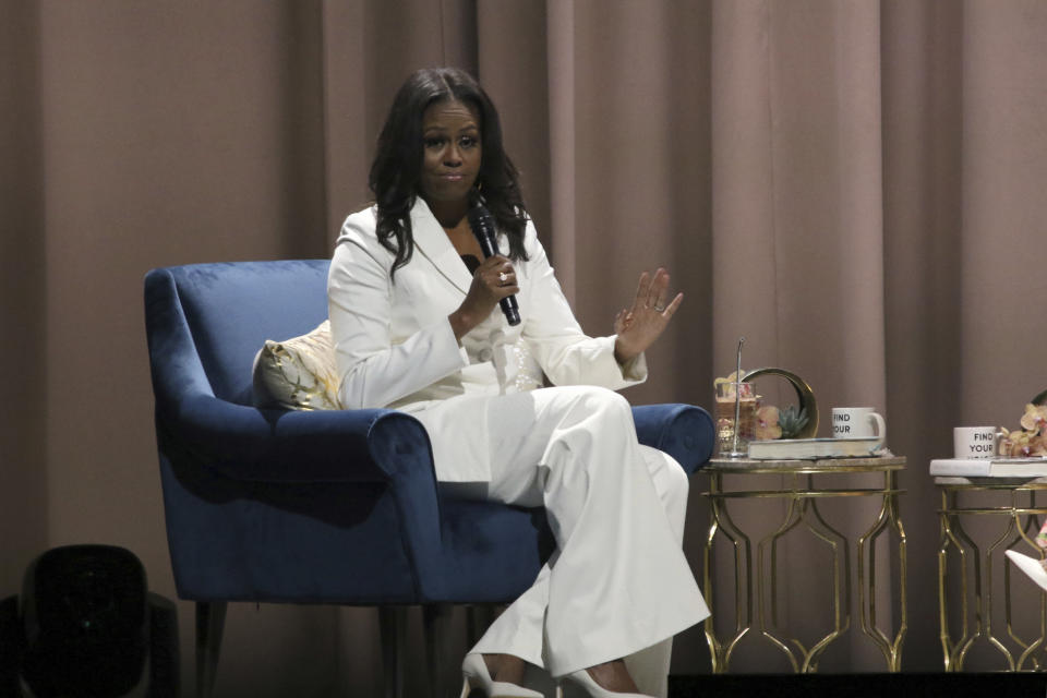 Former first lady Michelle Obama speaks at the "Becoming: An Intimate Conversation with Michelle Obama" event at the Forum on Thursday, Nov. 15, 2018, in Inglewood, Calif. (Photo by Willy Sanjuan/Invision/AP)