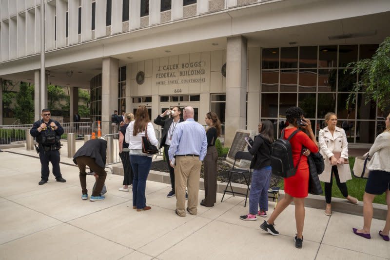 Reporters wait in line to enter the J. Caleb Boggs Federal Building in Wilmington, Del., on the third day of Hunter Biden's trial on criminal gun charges. Photo by Ken Cedeno/UPI .