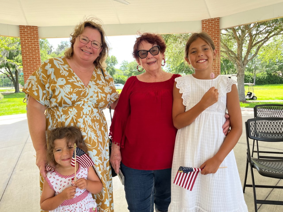 Ava Esquivel, right, who read her essay, was accompanied by both of her grandmothers, Denise Guynn, left, and Linda Esquivel, and also Olivia Esquivel, 3.