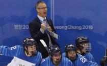 Ice Hockey - Pyeongchang 2018 Winter Olympics - Women's Bronze Medal Match - Finland v Olympic Athletes from Russia - Kwandong Hockey Centre, Gangneung, South Korea - February 21, 2018 - Finland coach Pasi Mustonen celebrates after the match. REUTERS/Kim Kyung-Hoon