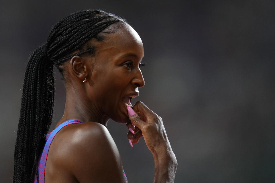 Dalilah Muhammad, of the United States prepares to start a Women's 400-meters hurdles semifinal during the World Athletics Championships in Budapest, Hungary, Tuesday, Aug. 22, 2023. (AP Photo/Petr David Josek)