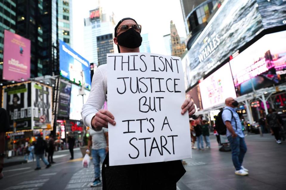 Black Lives Matter demonstrators gather in Times Square in New York City after the Derek Chauvin verdict.