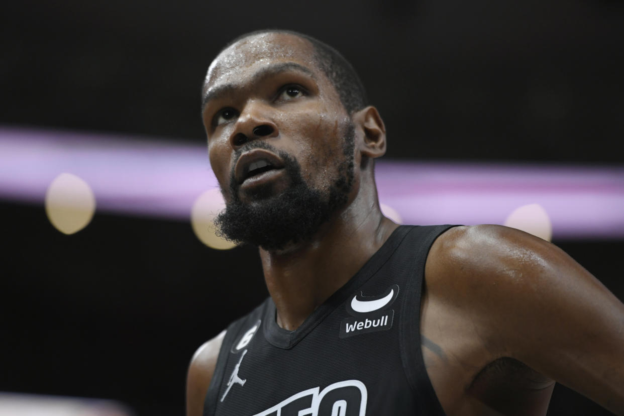 Brooklyn Nets&#39; Kevin Durant looks on during the second half of an NBA basketball game against the Chicago Bulls Wednesday, Jan. 4, 2023, in Chicago. Chicago won 121-112. (AP Photo/Paul Beaty)