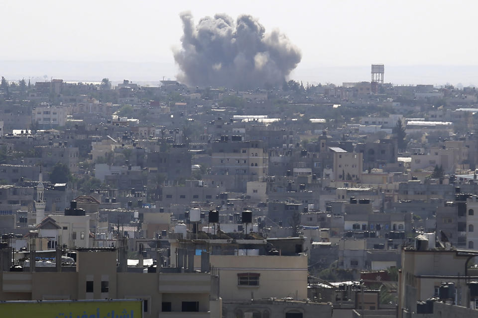 Smoke rises following an Israeli airstrike in Rafah, Gaza Strip, Saturday, Oct. 14, 2023. (AP Photo/Hatem Ali)