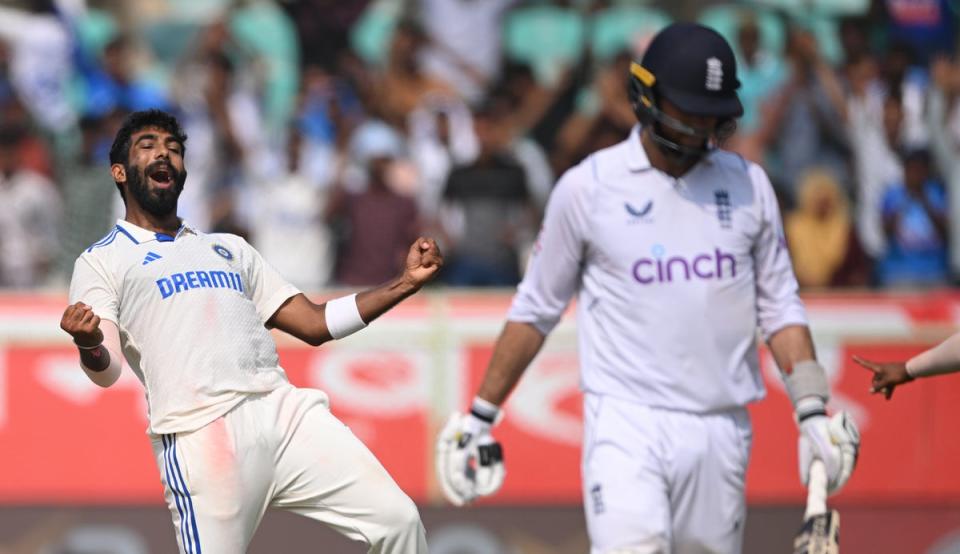 Celebration: Jasprit Bumrah helped to ensure that England fell well short of their record target at Vizag (Getty Images)