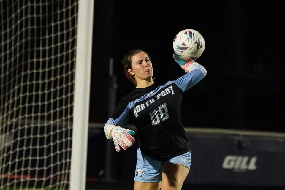 North Port goal keeper Autumn Matthews defends the goal during Friday night's playoff match against Palm Harbor University.