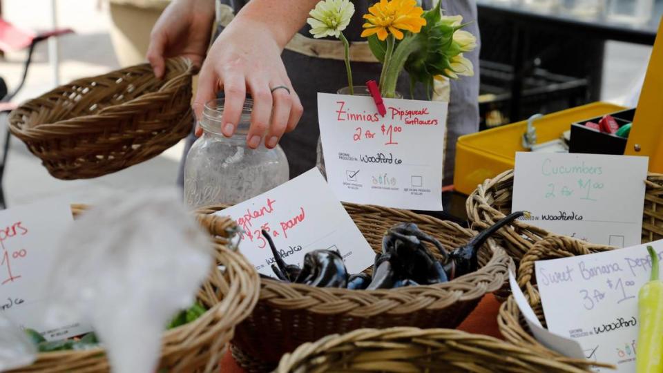 Items from Stonehedge Farm sit in woven baskets on Saturday, June 17, 2023 at the Fifth Third Pavilion in Lexington, Ky.