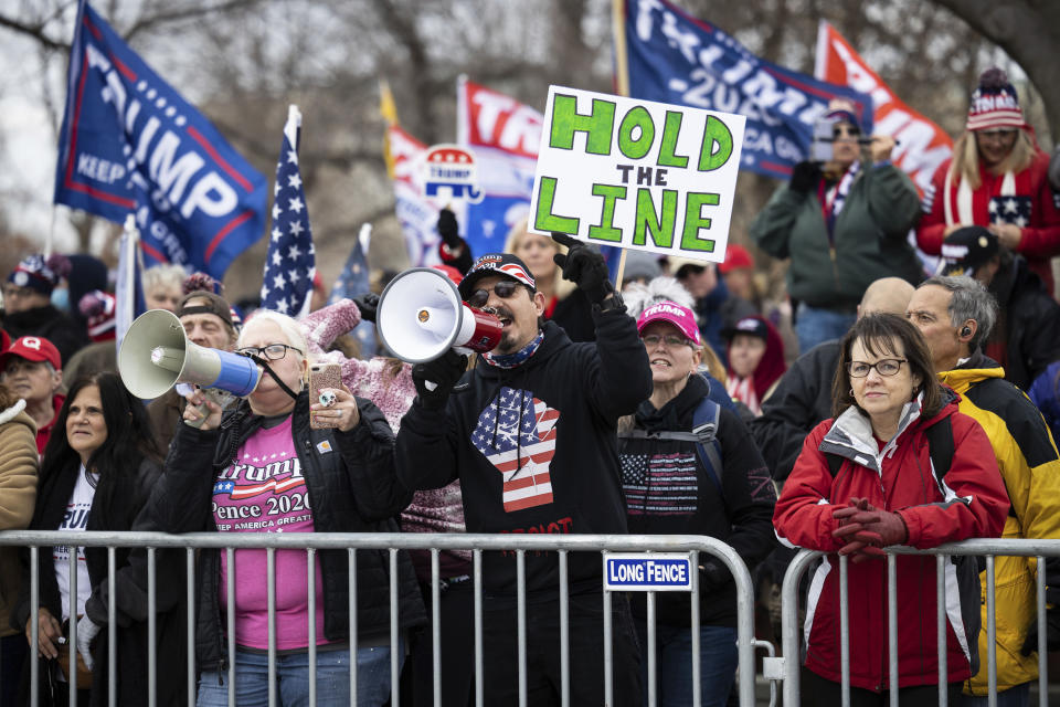 Supporters of President Donald Trump gather behind a police barricade on the east plaza of the U.S. Capitol onJan. 6 to protest the certification of President-elect Biden's Electoral  College victory. (Photo: Francis Chung/E&E News and Politico via AP Images)