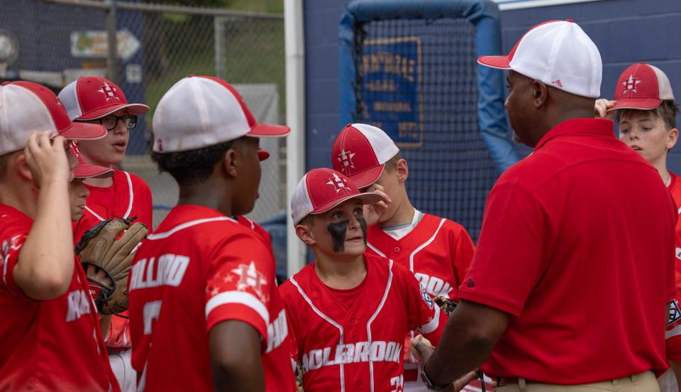 Holbrook Caoch Jason Ballrd talks to the team between innings. Holbrook Little League defeats Lincroft 5-0 in Sectional Tournament in Yardville, NJ on July 14, 2023. 