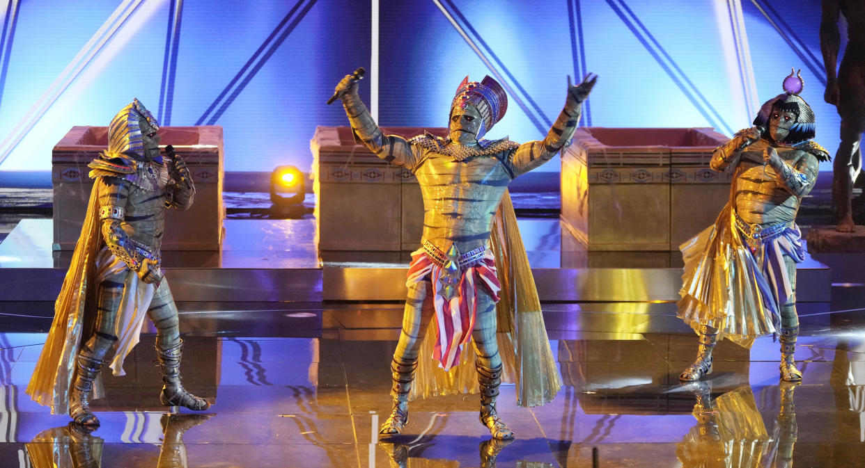 Mike Lookinland, Barry Williams and Christopher Night on the “TV Theme Night” episode of The Masked Singer airing on Oct. 5, 2022. (ABC via Getty Images)