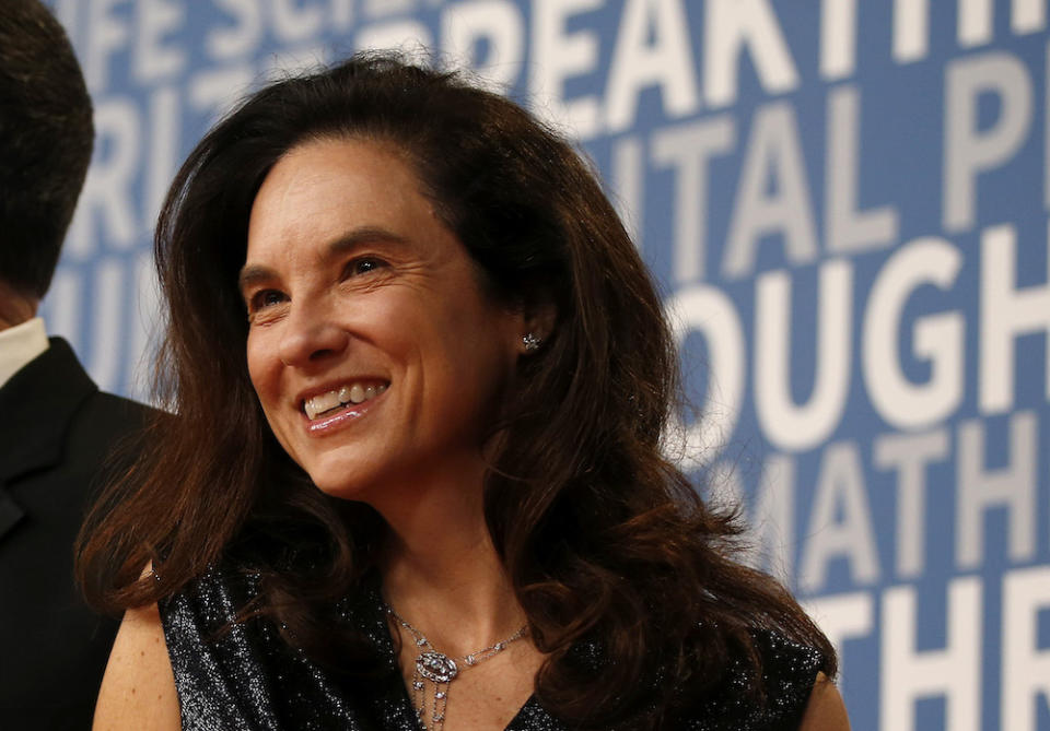 Caryn Marooney, right, vice president of technology communications at Facebook, poses for a picture on the red carpet for the 6th annual 2018 Breakthrough Prizes at Moffett Federal Airfield, Hangar One in Mountain View, Calif., on Sunday, Dec. 3, 2017. (N