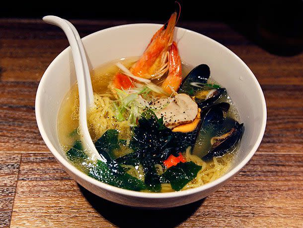 <p>Serious Eats / J. Kenji López-Alt</p> Shrimp, scalliops, and mussels in a bowl of ramen