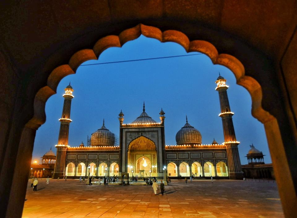 NEW DELHI, INDIA - JULY 31: A view of Jama Masjid illuminated on the eve of Eid-al Adha festival, on July 31, 2020 in New Delhi, India. The holy festival of sacrifice, which falls on the 10th day of Dhu al-Hijjah as per the Islamic lunar calendar, is being celebrated today. Bakra Eid or Bakrid is marked by sacrificing an animal that is close to them to prove their devotion and love for Allah. Post the sacrifice, devotees distribute the offering to family, friends, neighbours and especially to the poor and the needy. (Photo by Raj K Raj/Hindustan Times via Getty Images)