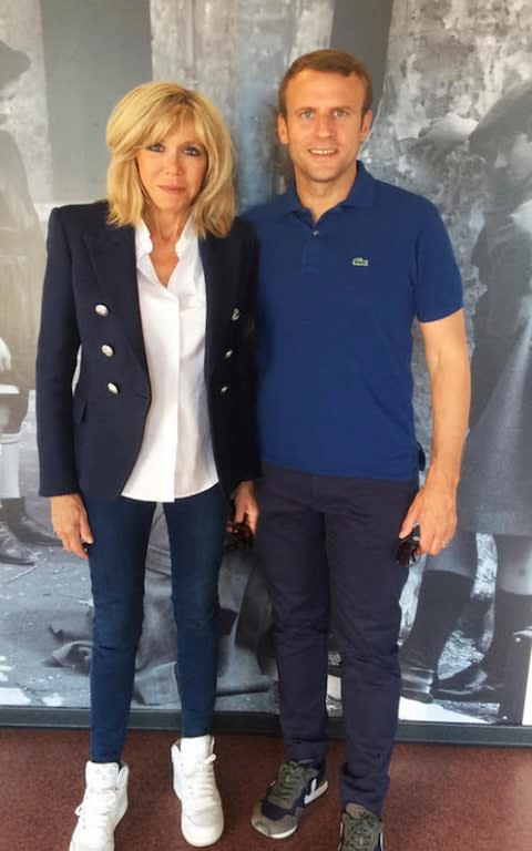 A posed picture of Mr Macron and his wife Brigitte during their visit to Marseille  - Credit: Splash