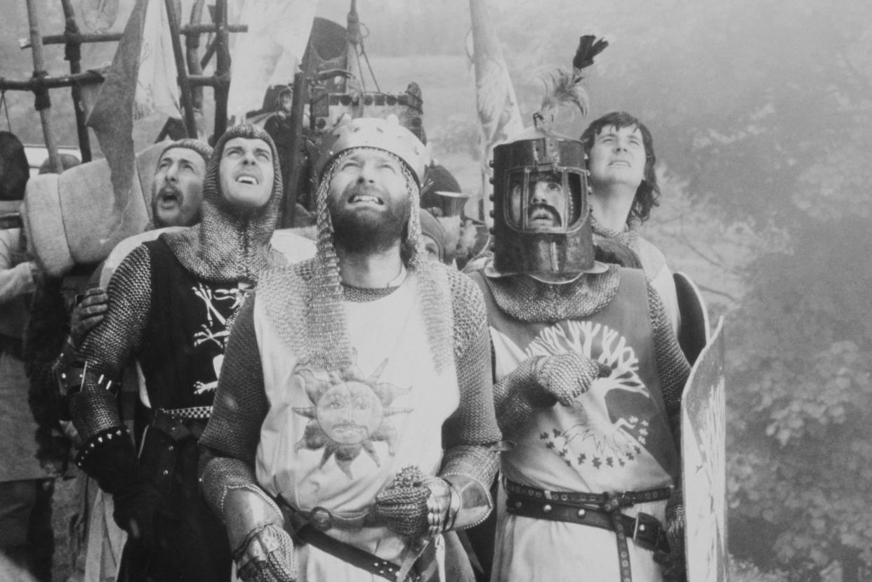 British comedians Eric Idle, John Cleese, Graham Chapman, Terry Jones and Michael Palin in a scene from 'Monthy Python and the Holy Grail', directed by Terry Gilliam and Terry Jones, 1975 (Photo by Warner Bros./Hulton Archive/Getty Images)