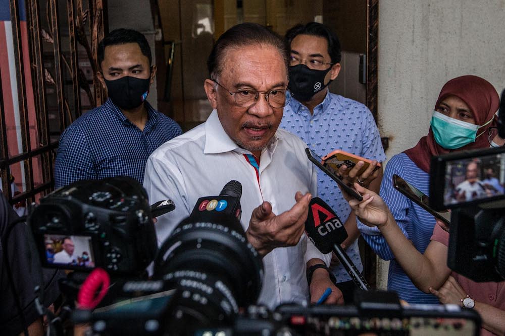 PKR president Datuk Seri Anwar Ibrahim speaks to reporters after meeting with the Pakatan Harapan presidential council in Petaling Jaya January 12, 2021. — Picture by Firdaus Latif