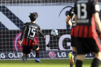Frankfurt's Daichi Kamada scores the opening goal during the German Bundesliga soccer match between Eintracht Frankfurt and Bayern Munich in Frankfurt, Germany, Saturday, Feb. 20, 2021. (Arne Dedert/POOL via AP)