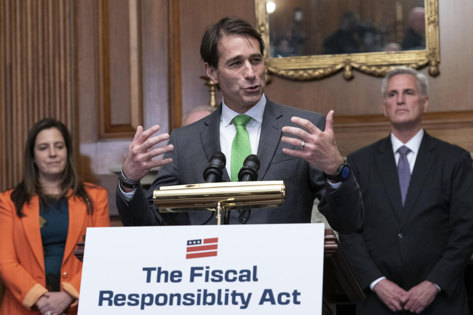 Rep. Garret Graves, R-La., flanked by House Republican Conference Chair Elise Stefanik, R-N.Y., and Speaker of the House Kevin McCarthy of Calif., speaks at a news conference after the House passed the debt ceiling bill at the Capitol in Washington, Wednesday, May 31, 2023. The bill now goes to the Senate. (AP Photo/Jose Luis Magana)