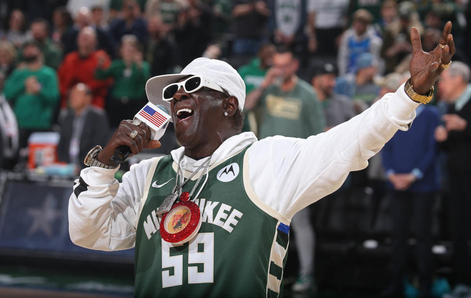 Flavor Flav sings national anthem at Milwaukee Bucks game on Oct. 29 (Gary Dineen / NBAE via Getty Images)