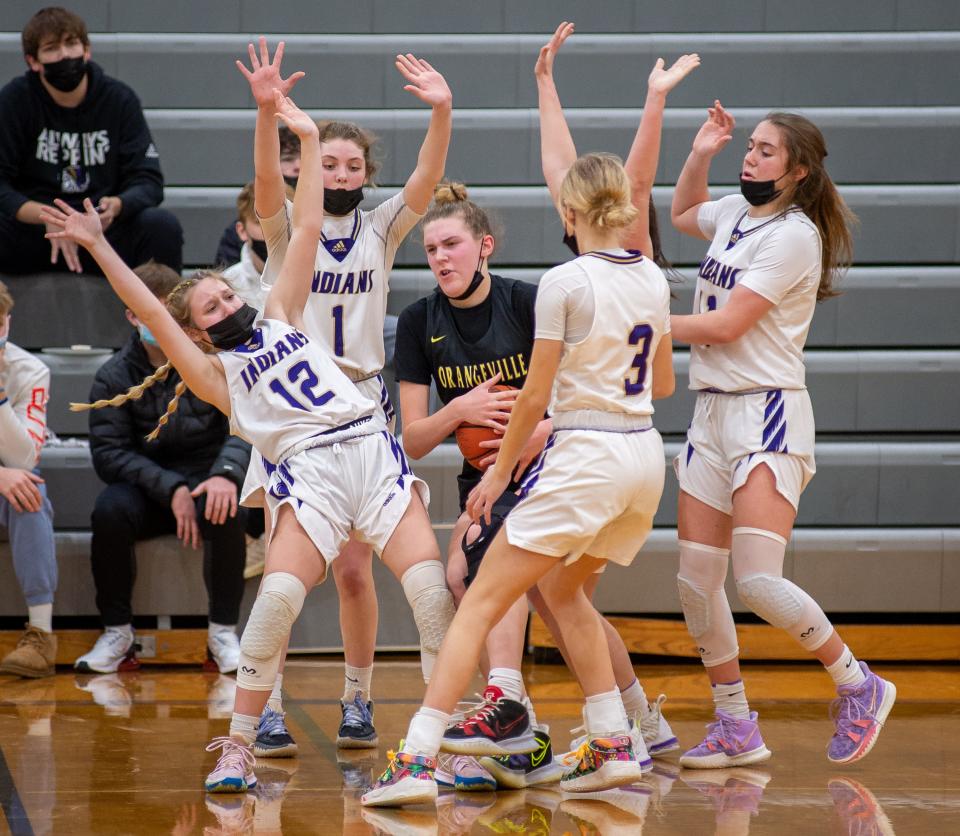 Orangeville's Whitney Sullivan tries to find a way out of Pecatonica's tight defense during the fourth quarter of their game on Saturday, Jan. 22, 2022, in Pecatonica.