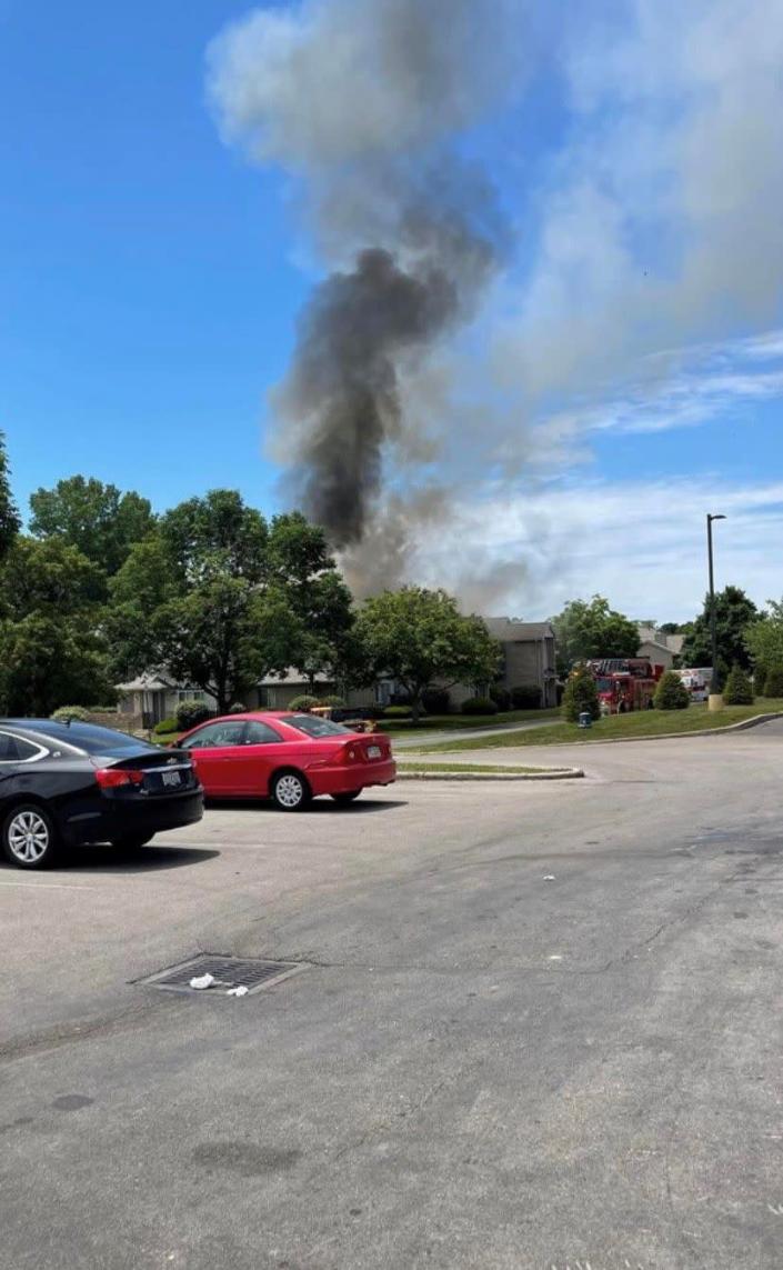 Firefighters battle fire at Mill Pond apartments in Bellbrook Monday afternoon.