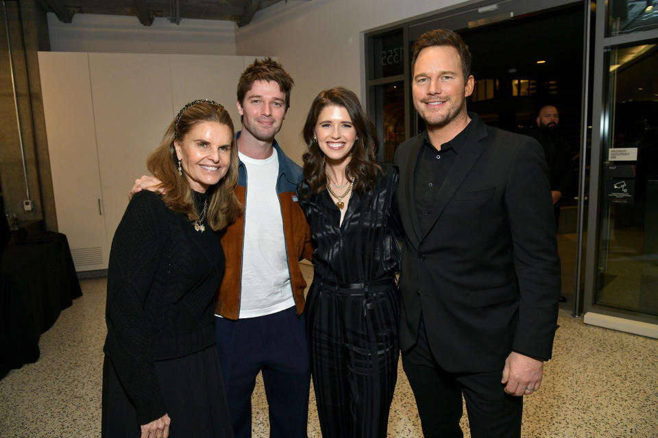 Chris Pratt and Katherine Schwarzenegger posing for a photo with Katherine's brother Patrick, and her mother Maria